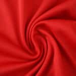 Close-up of red fabric from the Aberdeen Home 2025/26 fan version football shirt.