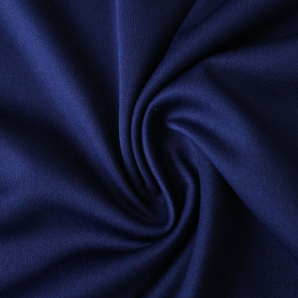Close-up of deep blue fabric used in the Ajax Away 2025/26 Fan Version football jersey.