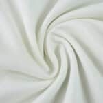 Close-up of Celtic Third 2025/26 fan version jersey fabric, showing light texture and weave pattern.