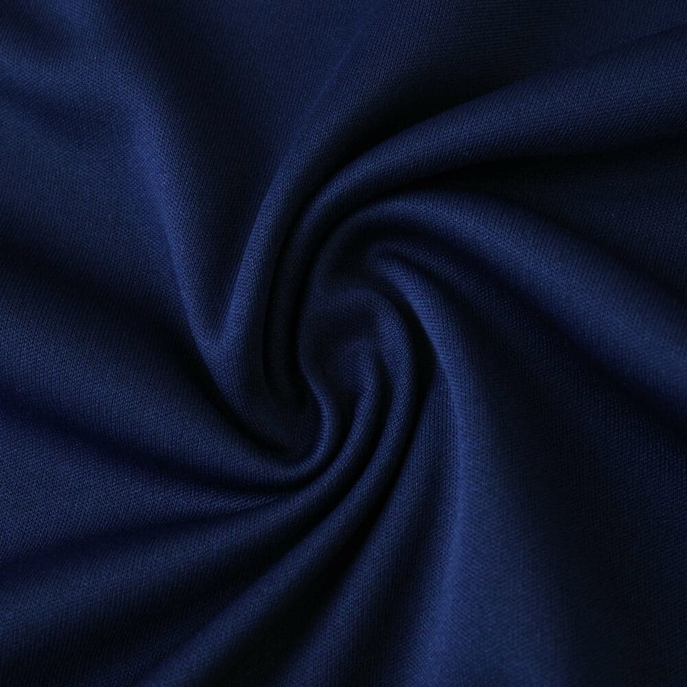 Close-up of dark blue fabric texture used for the Fenerbahce Home 2025/26 Fan Version jersey.