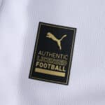 Close-up of the Puma Authentic Licensed Football badge on the Galatasaray Away 2025/26 Fan Version jersey.