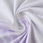Close-up of the 2025/26 Manchester United away fan jersey fabric in light purple with subtle patterns.