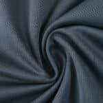 Close-up of dark blue fabric with a textured, breathable pattern for Rangers Third 2025/26 Fan Version jersey.