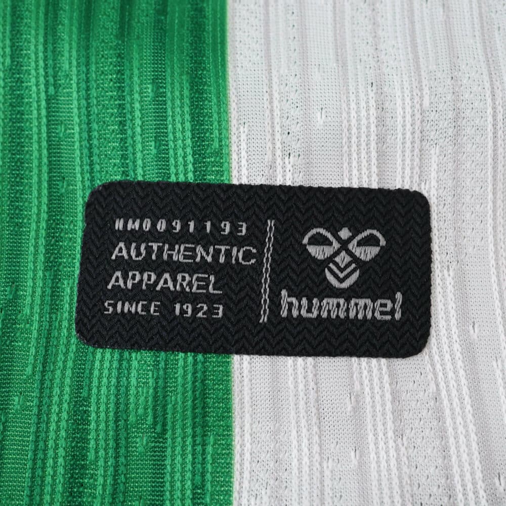 Close-up of the Real Betis 2025/26 Home Player Version shirt with Hummel authentic apparel label.
