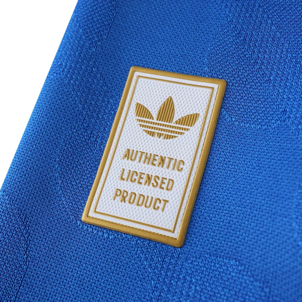 Close-up of the Authentic Licensed Product badge on the Real Madrid 2025/26 Third Player Version jersey.