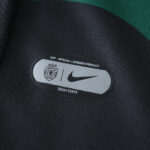 Close-up of Sporting CP 2025/26 third kit, featuring official club and Nike authenticity badge.