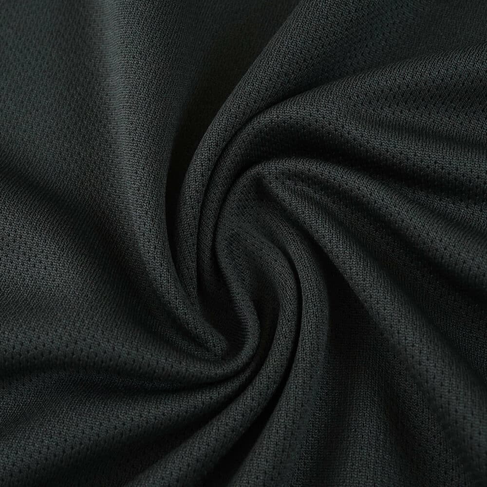 Close-up of black fabric texture for Union Berlin Away 2025/26 Fan Version jersey.