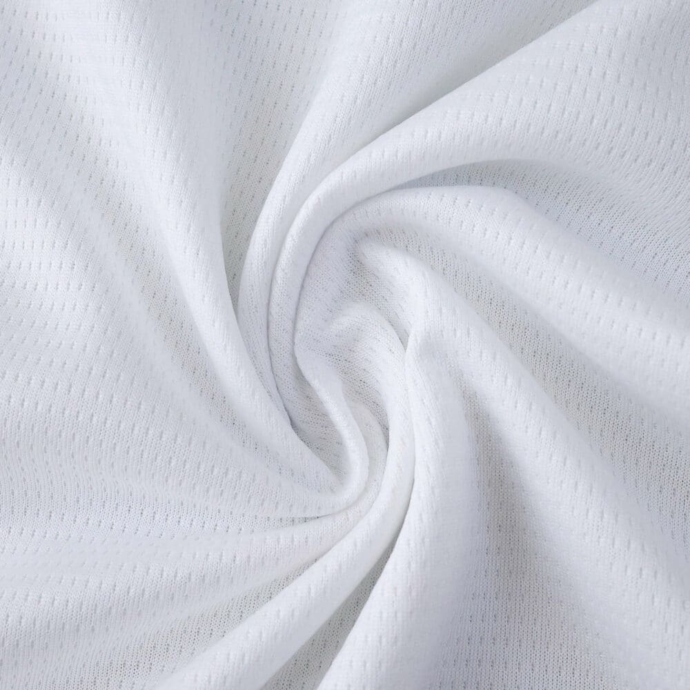 Close-up of white AC Milan Away 2025/26 Fan Version jersey fabric, showing texture and detail.