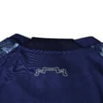 Back collar detail of Ajax Away 2025/26 Fan Version jersey, featuring a ribbon design with "XXX" and "2025".