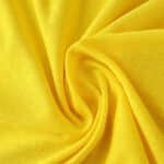 Close-up of yellow fabric used for the Borussia Dortmund 2025/26 Home Player Version jersey.