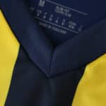 Close-up of the collar and fabric on the Fenerbahce Home 2025/26 Fan Version jersey.