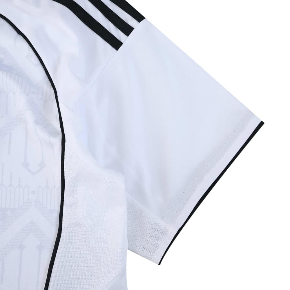 Close-up of the 2025/26 Fulham Home Fan Version jersey sleeve with black trim and subtle pattern detail.
