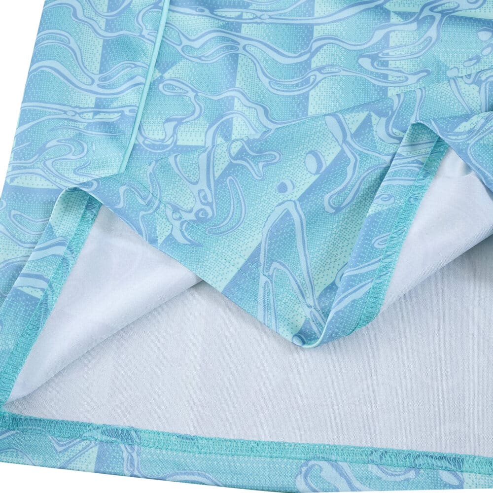 Close-up of Juventus Away 2025/26 Fan Version jersey fabric, showing unique blue pattern and stitching.