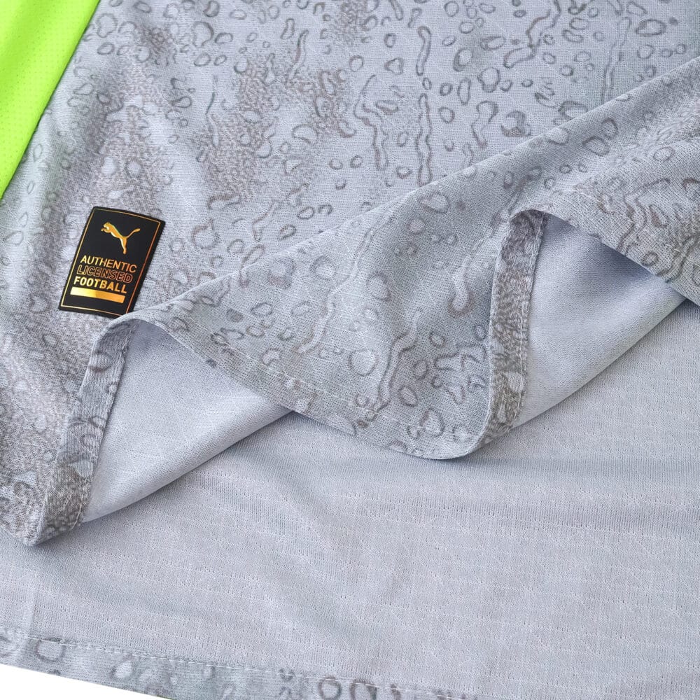 Close-up of Manchester City 2025/26 Third Player Version jersey fabric with Puma Authentic tag.