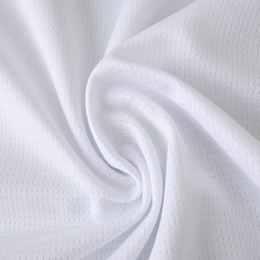 Close-up of white Parma Third 2025/26 Fan Version jersey fabric showing texture and weave.