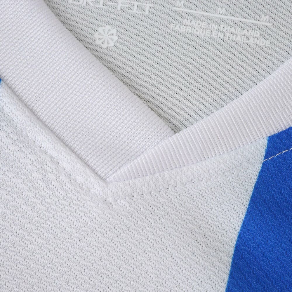 Close-up of the collar on the Brighton & Hove Albion 2025/26 home fan version jersey, showing fabric detail.
