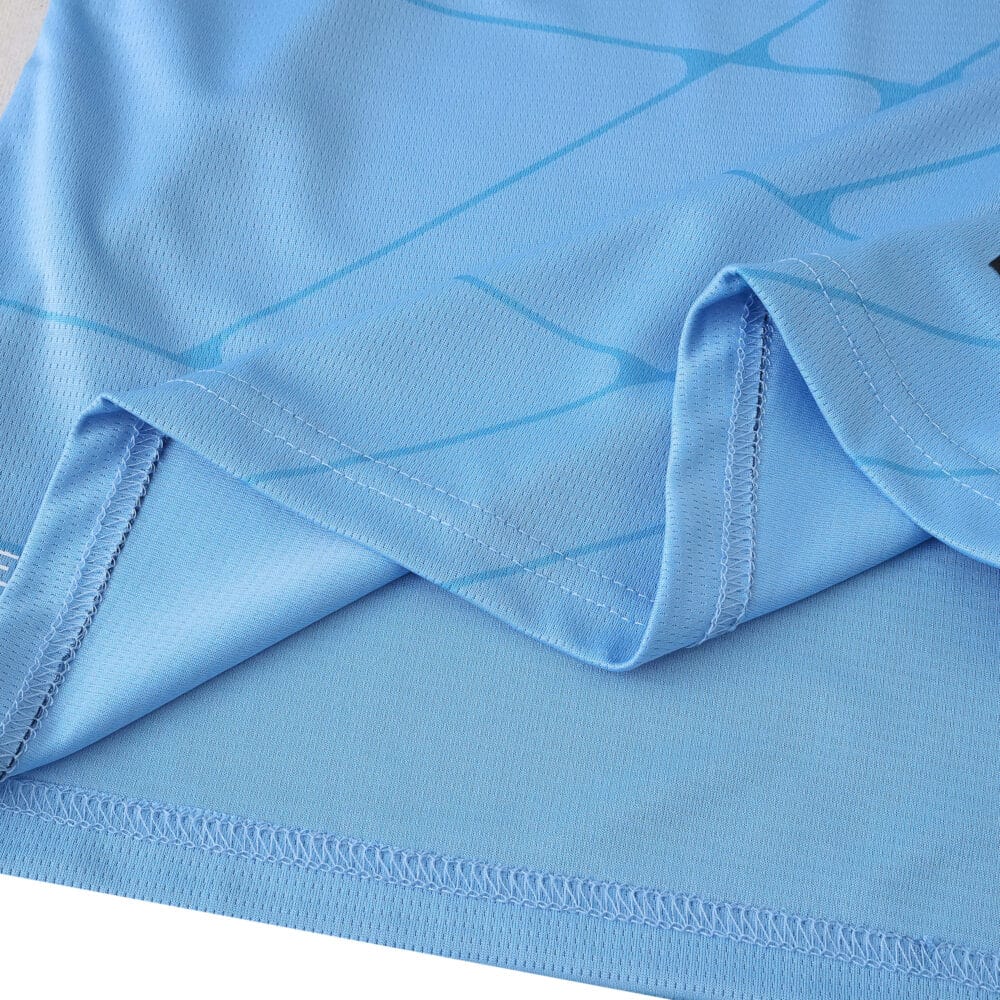 Close-up of the fabric and stitching detail on the Feyenoord Away 2025/26 Fan Version jersey in light blue.
