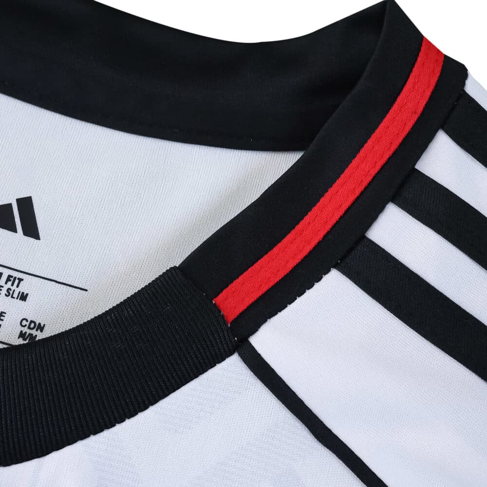 Close-up of Fulham Home 2025/26 Fan Version jersey collar with black and red stripe detail.