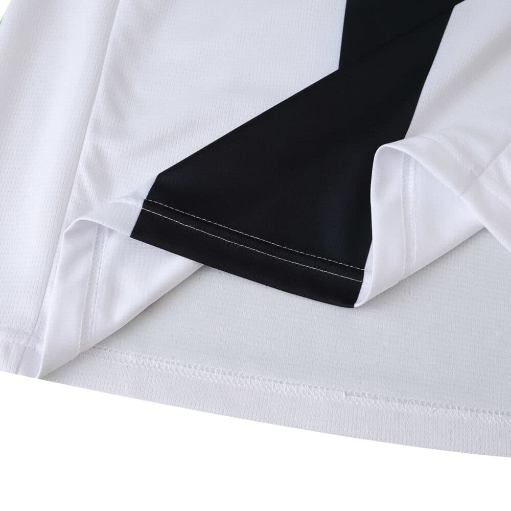Close-up of the Parma Home 2025/26 Fan Version jersey fabric showing stitching and black design detail.