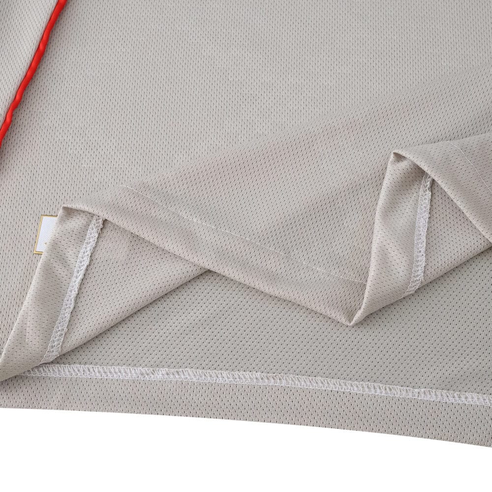 Close-up of SL Benfica Away 2025/26 Player Version jersey fabric showing texture and stitching details.