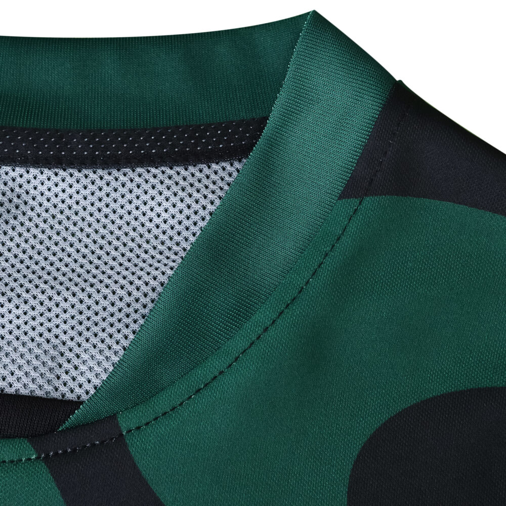 Close-up of the collar on the Sporting CP Third 2025/26 Fan Version jersey, showing green and black fabric details.
