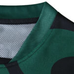Close-up of the collar on the Sporting CP Third 2025/26 Fan Version jersey, showing green and black fabric details.