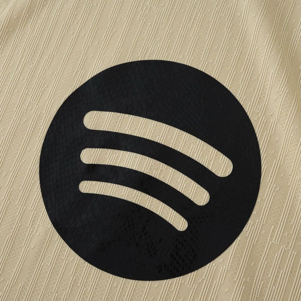Close-up of the Spotify logo on the Barcelona Away 2025/26 Player Version jersey fabric.