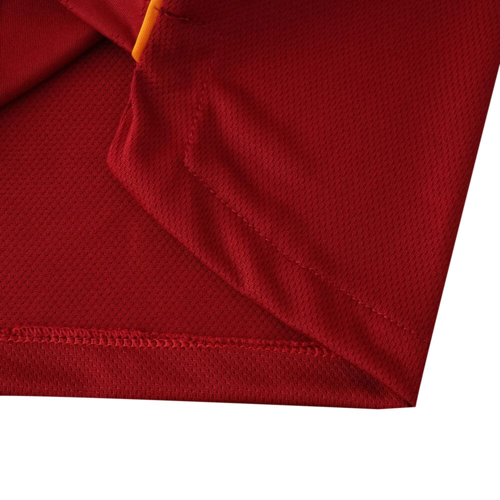Close-up of the Roma 2025/26 Home Player Version jersey fabric and stitching detail.