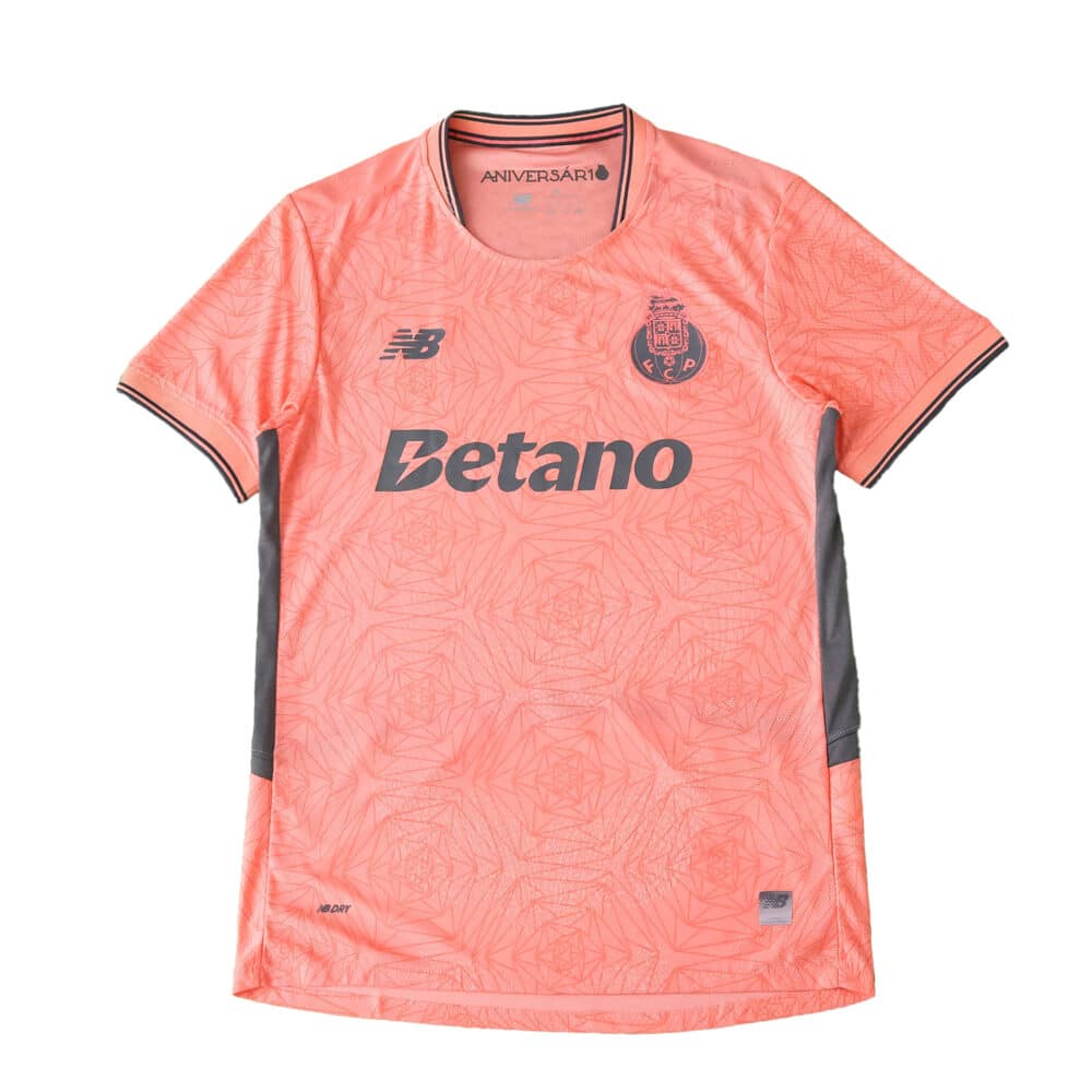 FC Porto 2025/26 away player version jersey in coral pink with club crest and Betano sponsor logo.