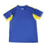 Back view of the Leeds United 2025/26 away fan jersey in blue with yellow accents.