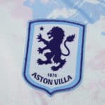 Close-up of the Aston Villa crest on the 2025/26 third fan version jersey.