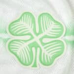 Close-up of the Celtic Third 2025/26 Player Version kit featuring a green four-leaf clover crest.
