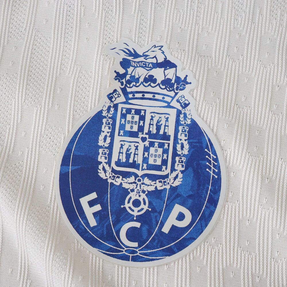 Close-up of the FC Porto crest on the 2025/26 Third Player Version jersey fabric.