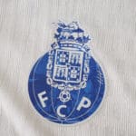 Close-up of the FC Porto crest on the 2025/26 Third Player Version jersey fabric.