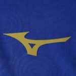 Gold Mizuno logo on blue fabric from the AS Monaco Away 2025/26 Fan Version jersey.