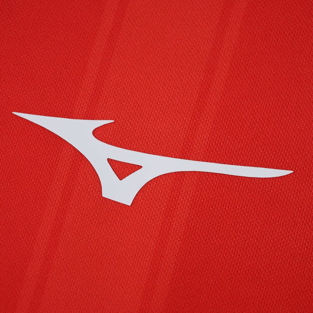 Close-up of the Mizuno logo on the red fabric of the AS Monaco 2025/26 Home Fan Version jersey.