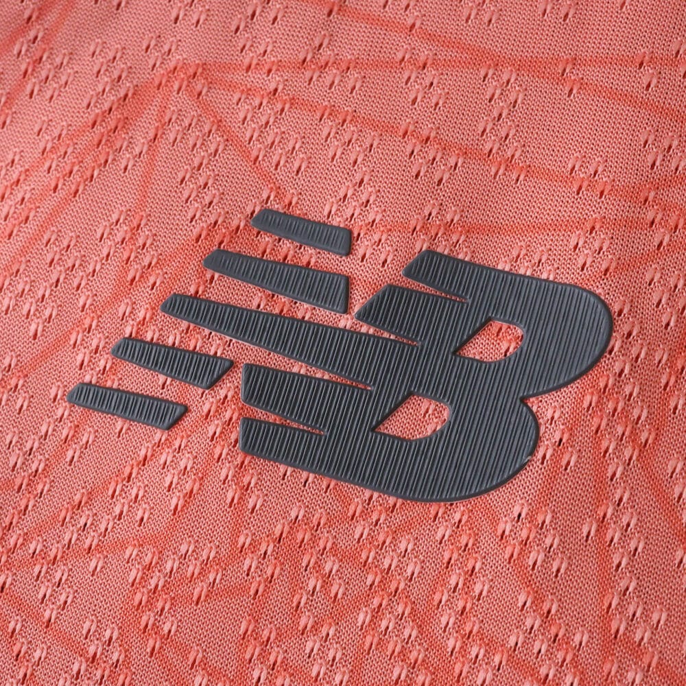 Close-up of the New Balance logo on the FC Porto 2025/26 Away Player Version jersey fabric.