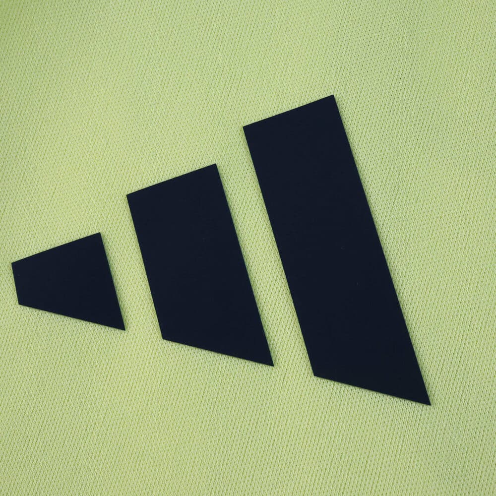 Close-up of the Adidas logo on the Fenerbahce Away 2025/26 Fan Version jersey fabric.