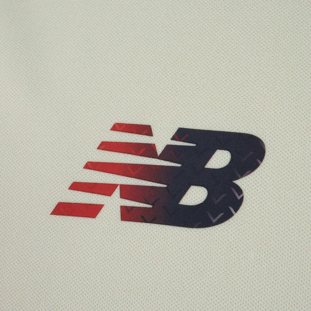 Close-up of the New Balance logo on the Lille LOSC 2025/26 Away Fan Version jersey.