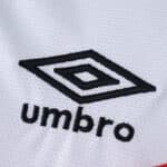 Close-up of Umbro logo on the Rayo Vallecano 2025/26 Home Fan Version jersey fabric.