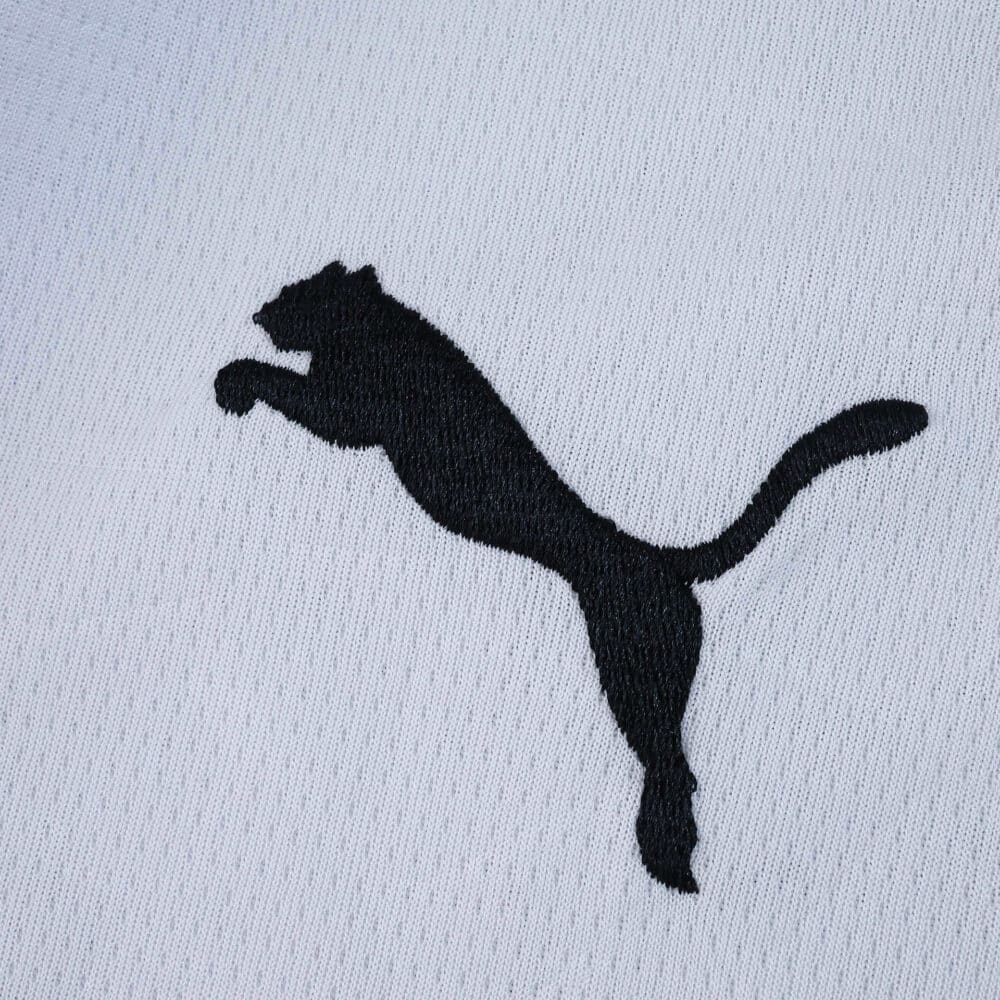 Close-up of black Puma logo embroidered on the 2025/26 Valencia Home Fan Version jersey fabric.