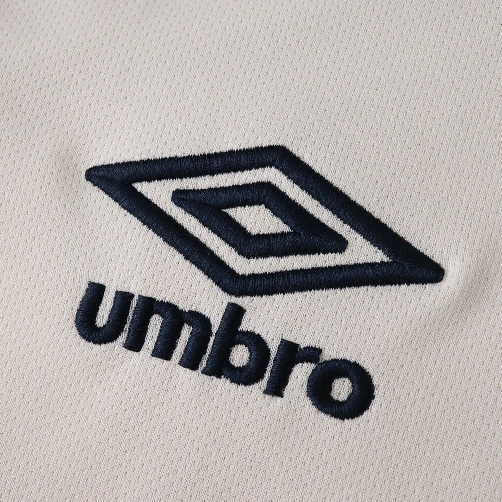 Close-up of the Umbro logo embroidered on the West Ham United 2025/26 Away Fan Version jersey.