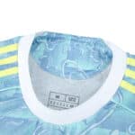 Close-up of Juventus Away 2025/26 Player Version jersey collar with yellow shoulder stripes.