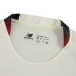 Close-up of Lille LOSC Away 2025/26 Fan Version jersey collar with New Balance branding.