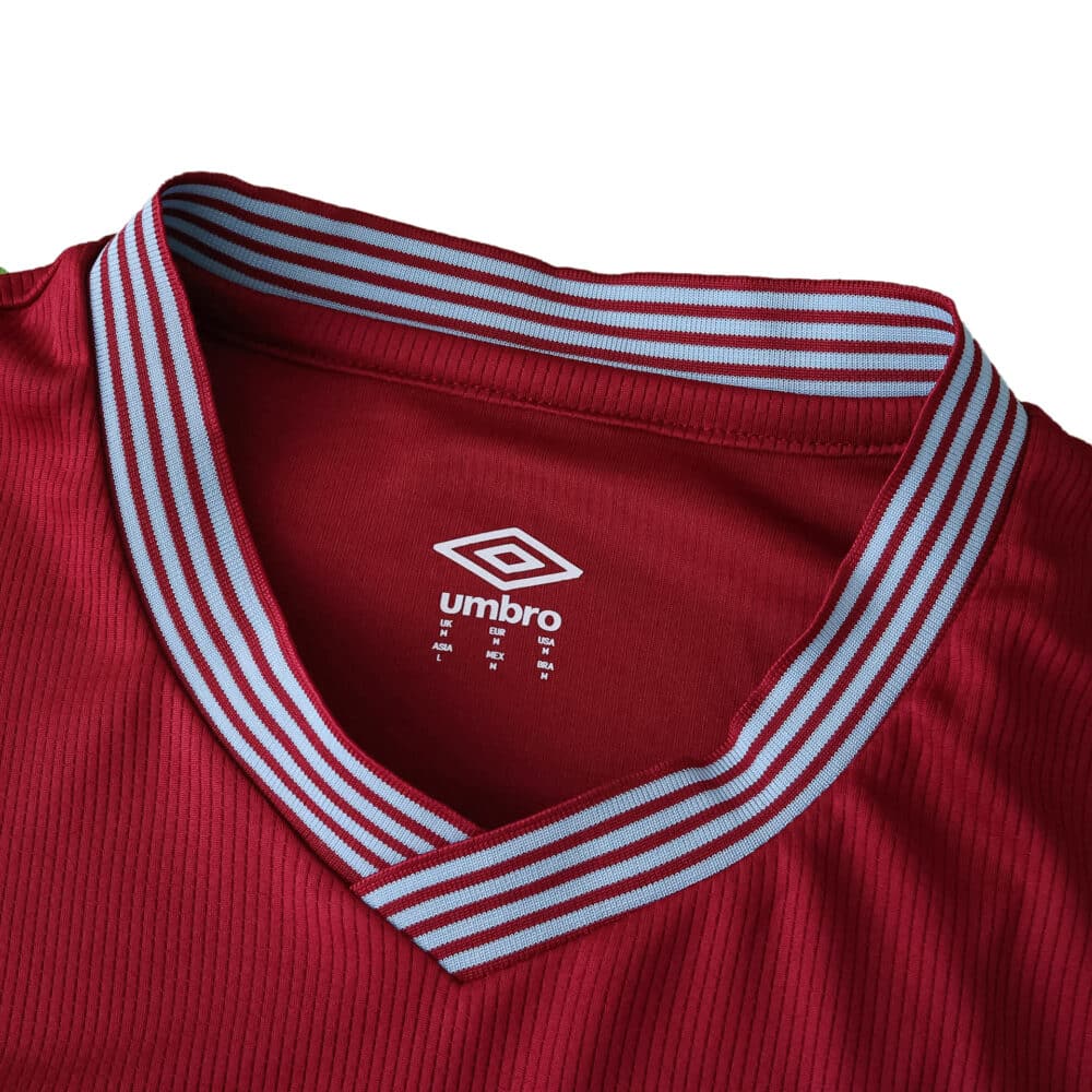 Close-up of the 2025/26 West Ham United Home Player Version jersey collar with Umbro logo.
