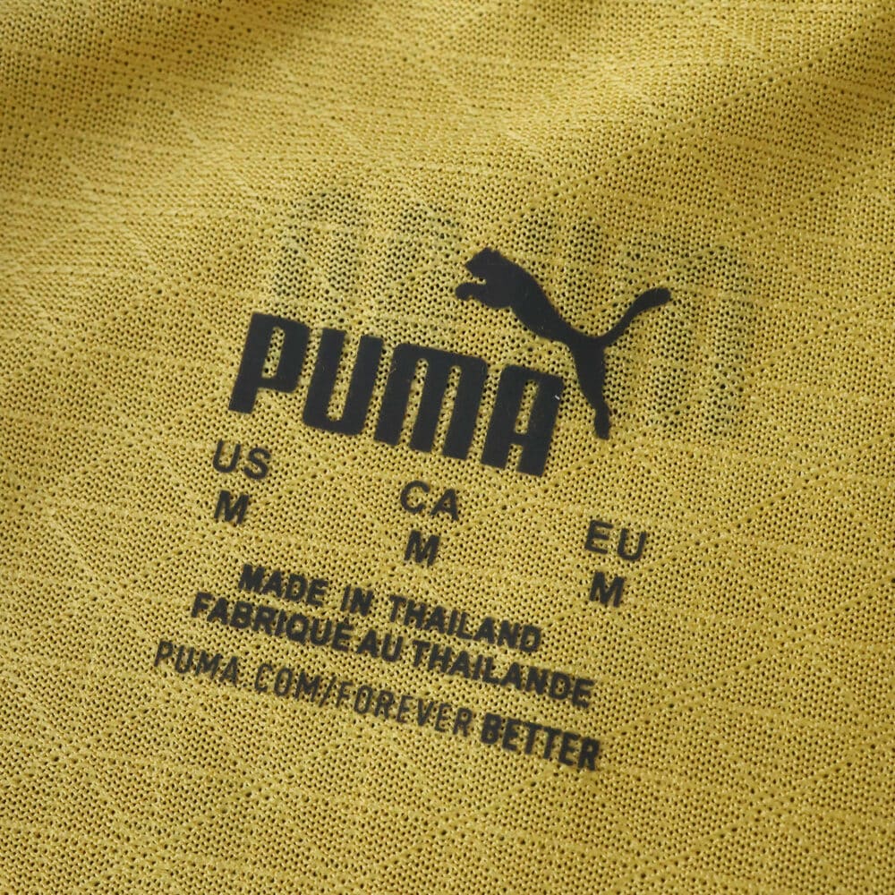 Close-up of AC Milan Third 2025/26 Player Version jersey tag with Puma logo and size information.