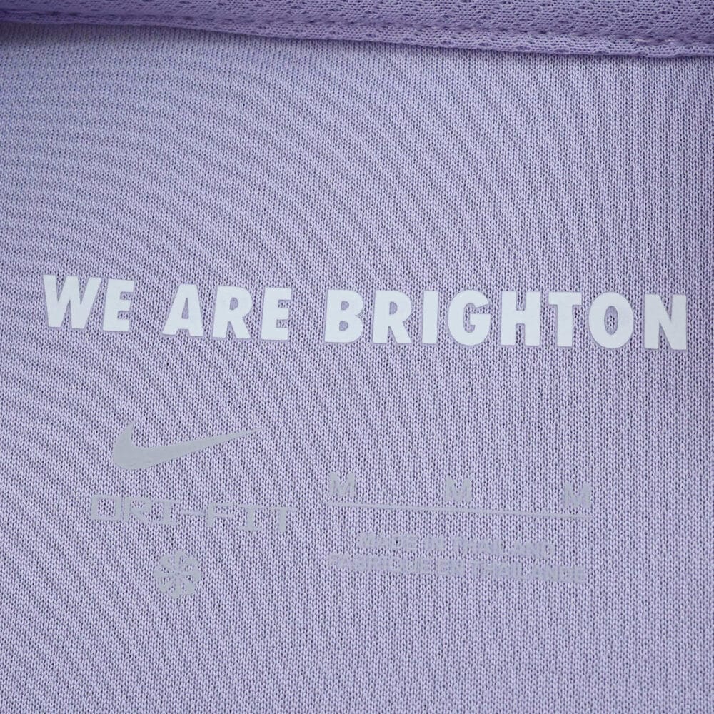 Detail of Brighton & Hove Albion Away 2025/26 Fan Version jersey with "WE ARE BRIGHTON" text inside collar.