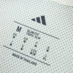 Celtic Third 2025/26 Player Version jersey inner label showing size M and slim fit details.