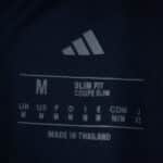 Adidas label inside Fenerbahce Third 2025/26 Fan Version jersey, showing size M and slim fit details.