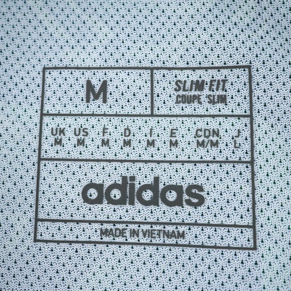 Juventus Away 2025/26 Player Version jersey size label, adidas branding, slim fit, made in Vietnam.